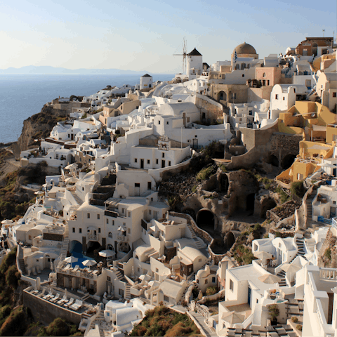 Explore the historic Oia Castle – a leisurely stroll away