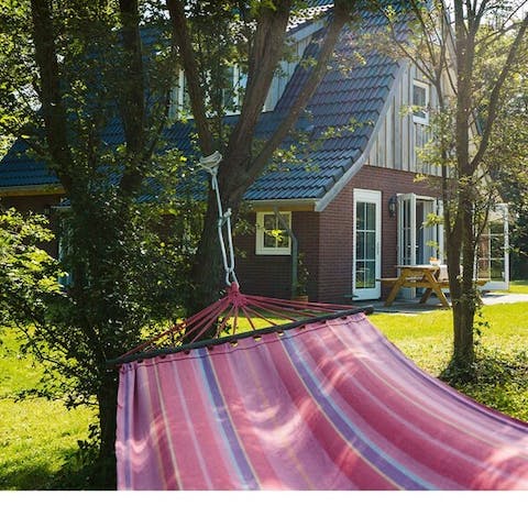 Relax and unwind in the hammock with the birds chirping around you 