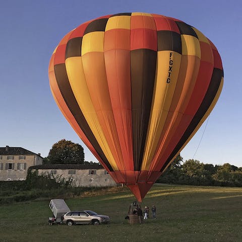 Ask your host to arrange a hot air balloon trip above the grounds of this home