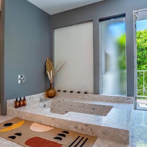 Experience ultimate relaxation in the sunken bath tub