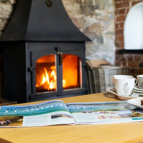 Curl up by the roaring wood-burning fire