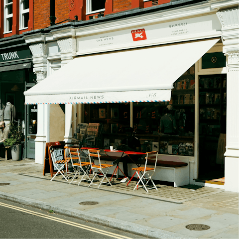 Take a pause and soak up the atmosphere from a local cafe