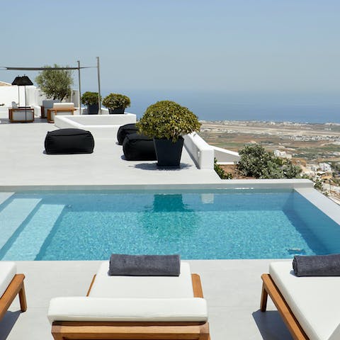 Laze on sun loungers and take the occasional dip in the private pool