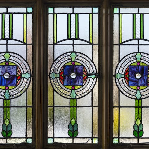 Explore the manor and admire all the stained glass windows hidden throughout