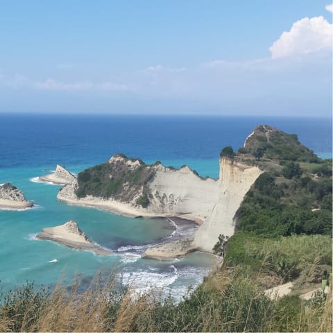 Explore the scenic Corfu coastline by boat, or head across the water to local beach tavernas