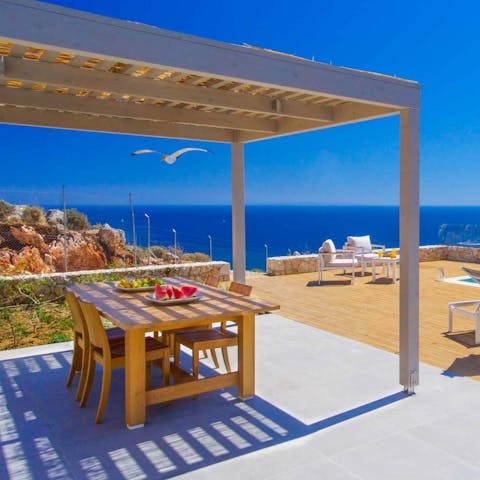 Feast on Ionian sea views while you dine alfresco