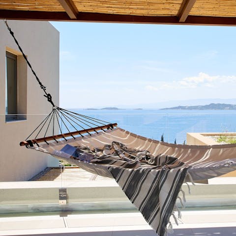 Relax all afternoon in the hammock after a few glasses of Greek wine
