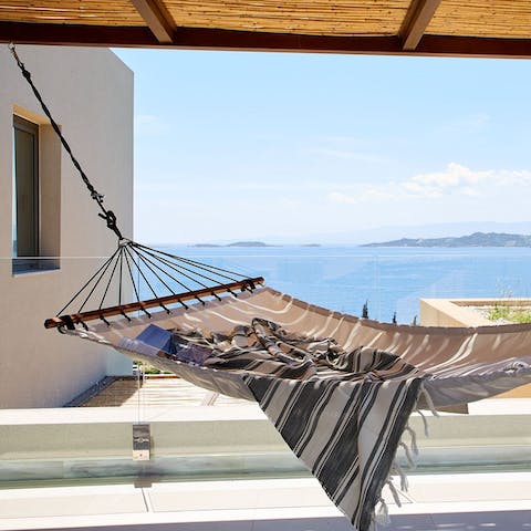 Relax all afternoon in the hammock after a few glasses of Greek wine