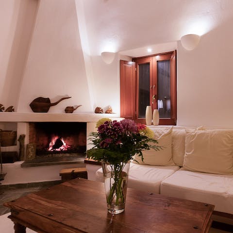 Get toasty and warm next to the traditional fireplace in the living room