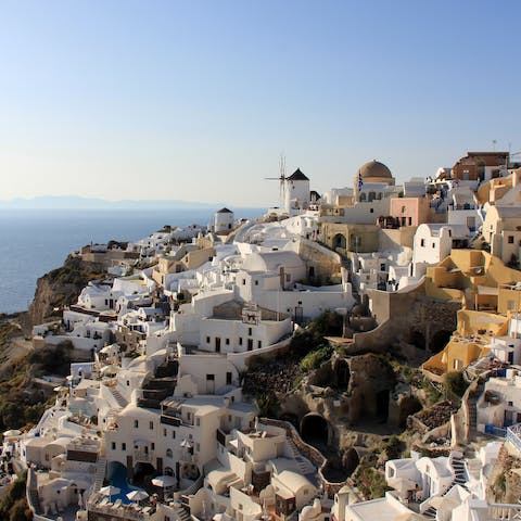 Drive to the main town of Thera in under five minutes and take in the white architecture