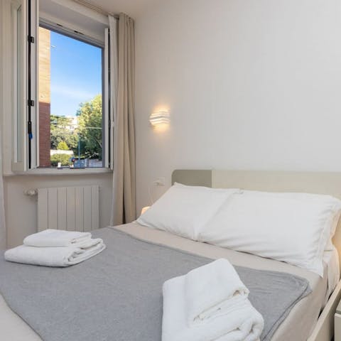 Get cosy in the bedroom after a long day exploring Rome on foot