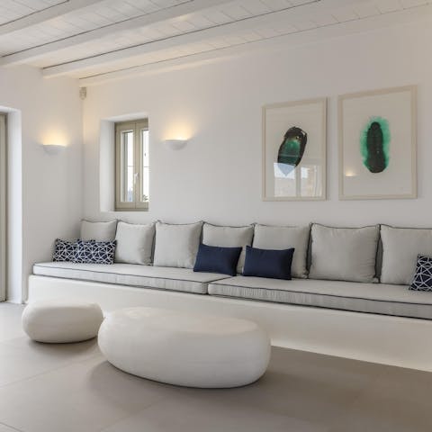 Hang out in the trendy Cycladic-style living space 