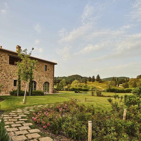 Explore the expansive gardens, nestled in the Tuscan countryside