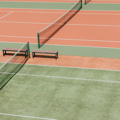 Enjoy a friendly match on the private tennis court