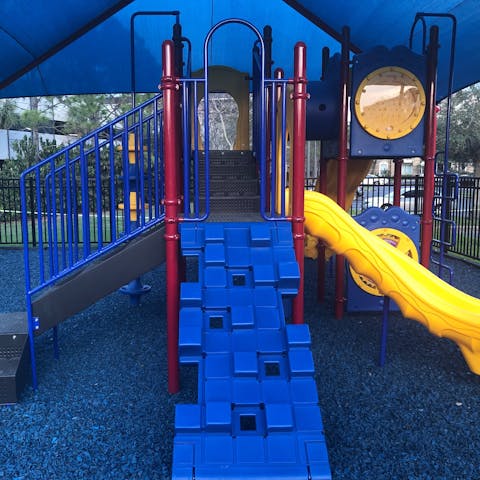 Play with the kids on the various slides and obstacles 