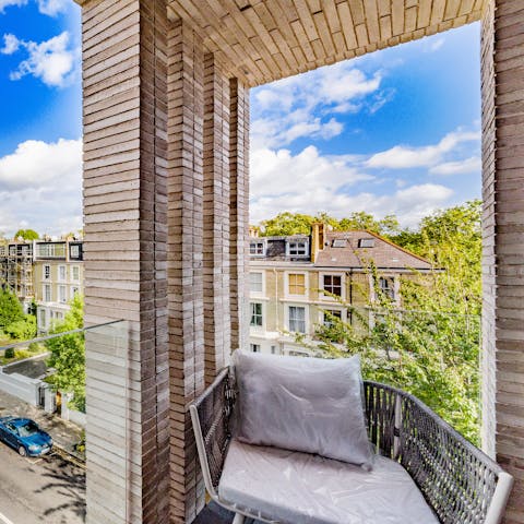 Look out over the leafy London streets from your private balcony