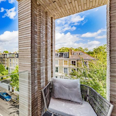 Look out over the leafy London streets from your private balcony