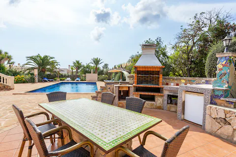 Host an alfresco dinner party of tapas cooked on the outdoor kitchen area