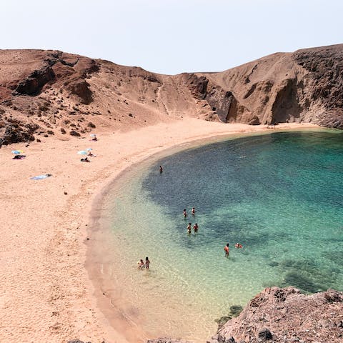 Swim and sunbathe on the spectacular beaches of Playa Blanca