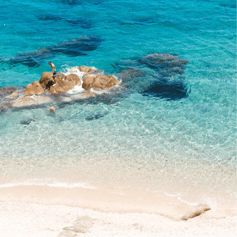 Pack a beach bag and take the short stroll to Agios Stefanos
