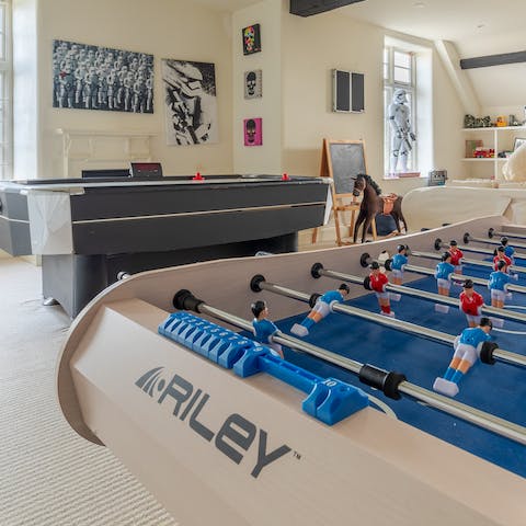 While away rainy afternoons in the home's games room or gym