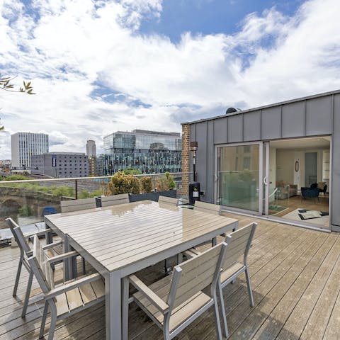 Enjoy an alfresco dinner on the rooftop terrace with its views of London