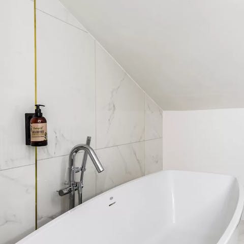 Finish the day with an indulgent soak in the apartment's bathtub