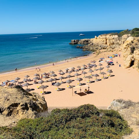 Catch a boat to sandy Cabanas de Tavira beach