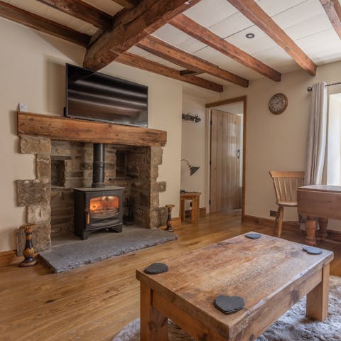 Light the log burner and cosy up in the living room