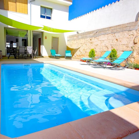 Lounge by the pool or go for a dip in the pool to escape the Spanish heat