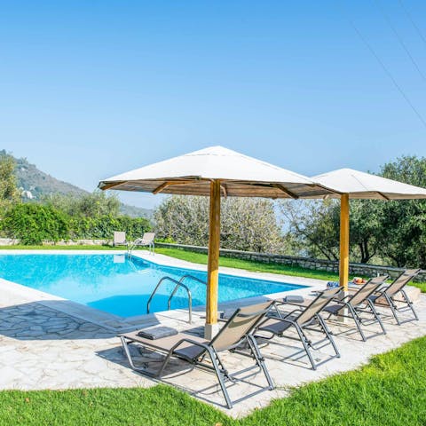 Spend sunny days lounging by the pool, taking in the countryside views