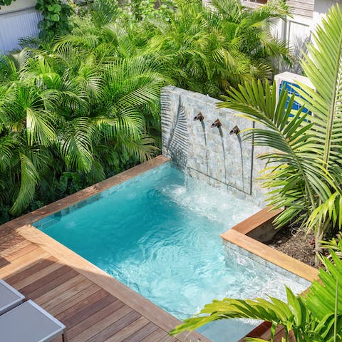 Take a cooling dip in the shared plunge pool, complete with stunning water feature