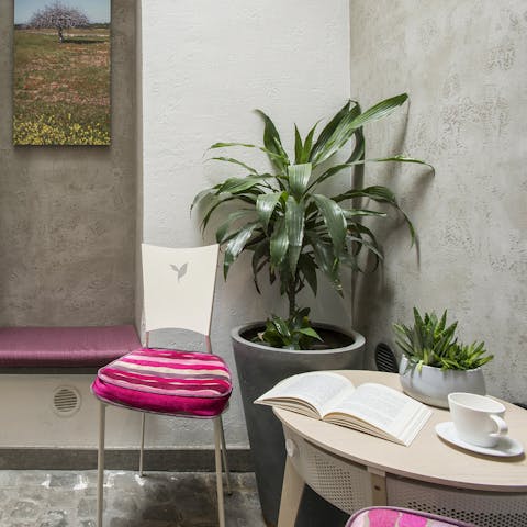 Enjoy a Campari and soda surrounded by plants in the internal courtyard