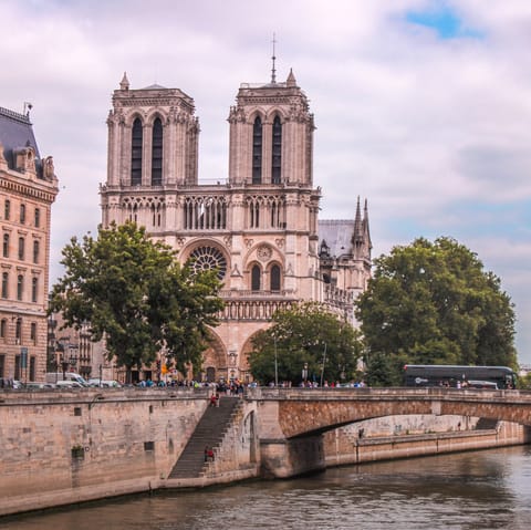 Enjoy a leisurely stroll along the Seine towards Notre Dame