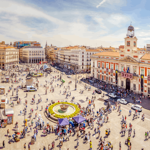 Feel the energy of the bustling squares of the city