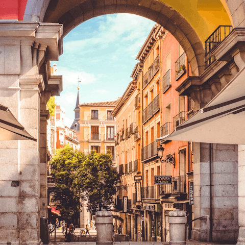 Visit the vibrant Plaza Mayor, just a fifteen-minute walk away