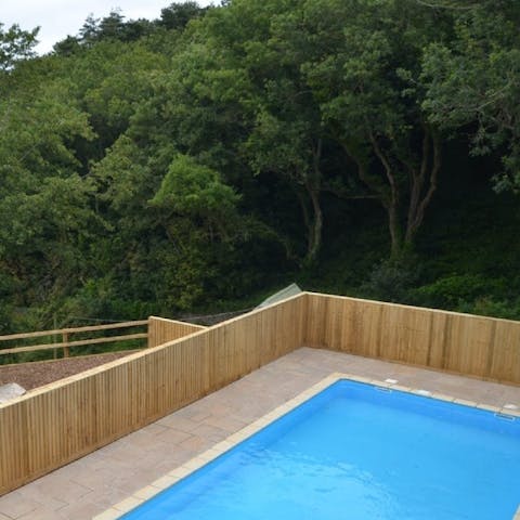 Take a dip in the shared on-site swimming pool during the summer months