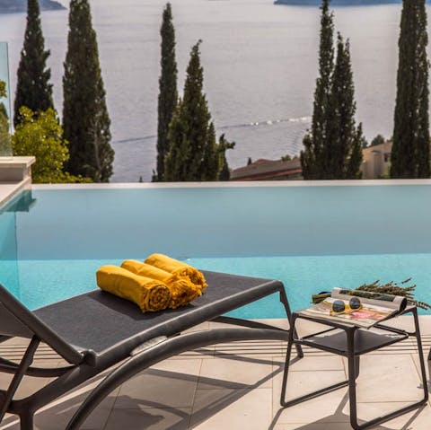 Enjoy sweeping views across the Adriatic whilst lounging by the pool