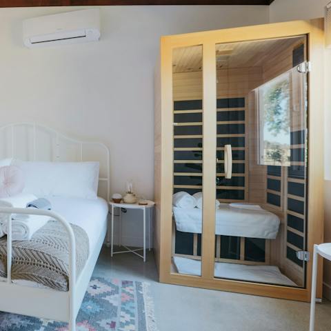 Treat yourself to a pamper session in the main bedroom's sauna