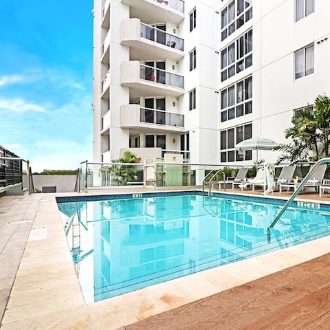 Take a refreshing dip in the communal pool