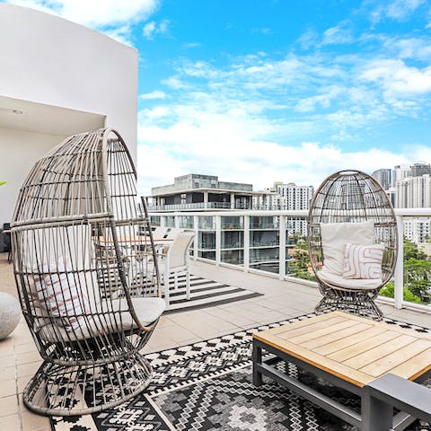 Take in city views from the shared rooftop terrace