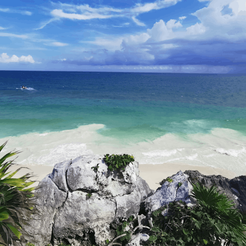 Explore the beautiful beaches of Tulum – a short ride away