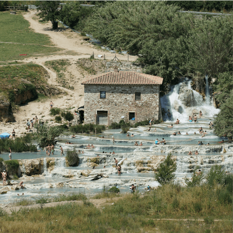 Visit the hot springs in Saturnia, 30km away