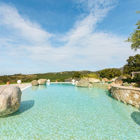 Enjoy a refreshing dip in the communal pool