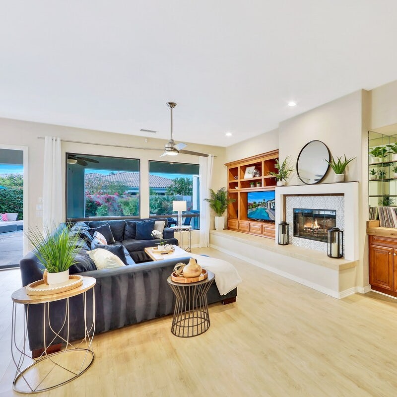 Cosy up by the electric fireplace on a chillier evening