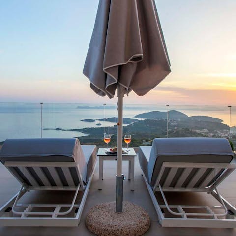 Take in views over the Ionian Sea from the patio, a glass of wine in hand