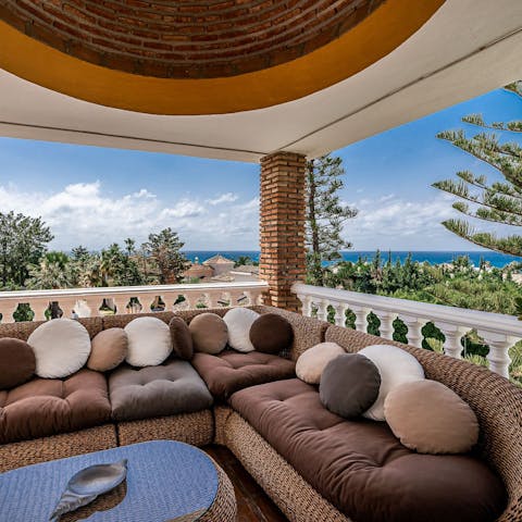 Take in views of the Mediterranen Sea from the balcony lounge