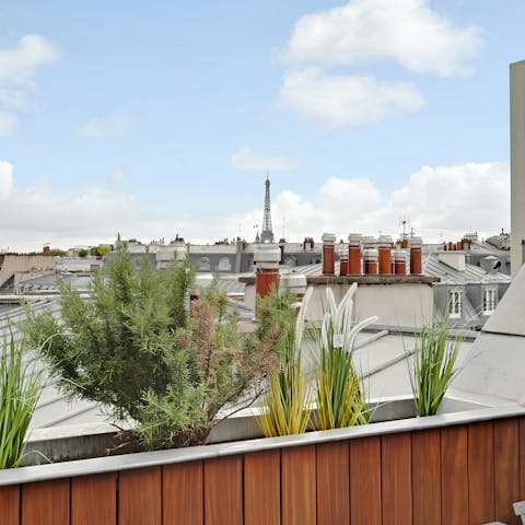 Admire the Eiffel Tower views from the private terrace