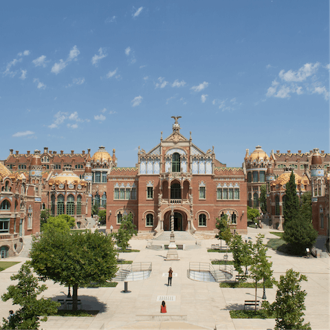 Admire the art and stained glass of Recinte Modernista de Sant Pau – it's twenty-six minutes away on the metro