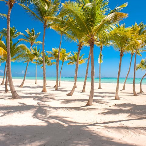 Access an exclusive beach club with white-sand serenity in Punta Cana